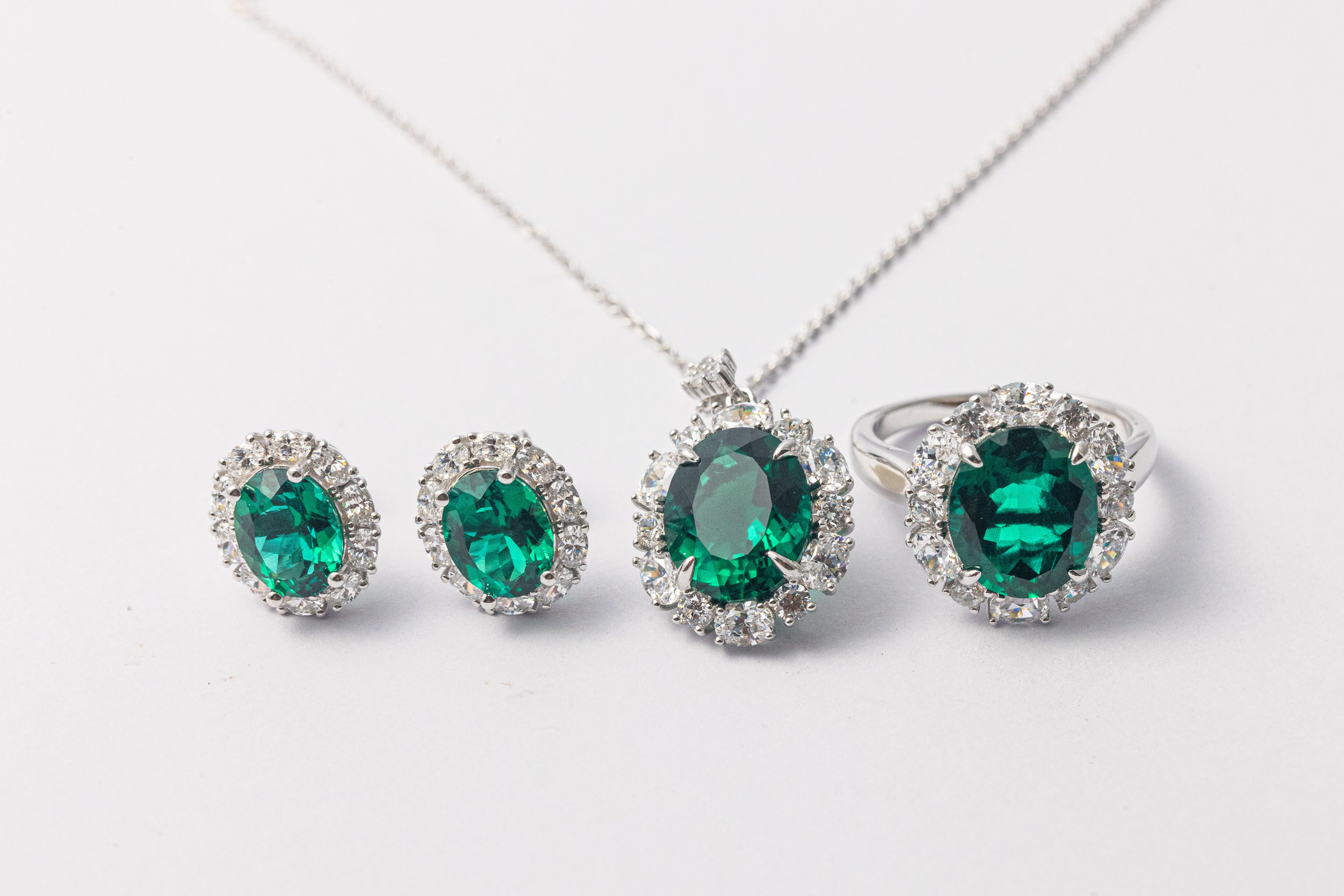 925 Sterling Silver Emerald Oval Halo Jewelry Set