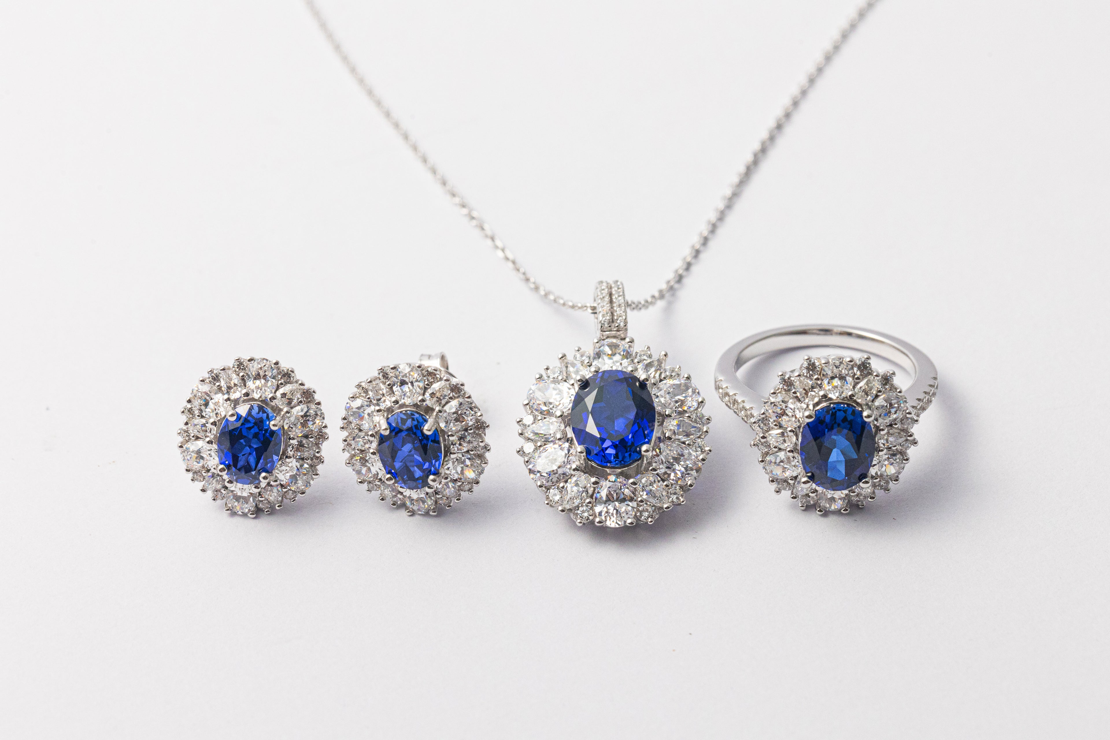 925 Sterling Silver Blue Sapphire Oval Halo Jewelry Set